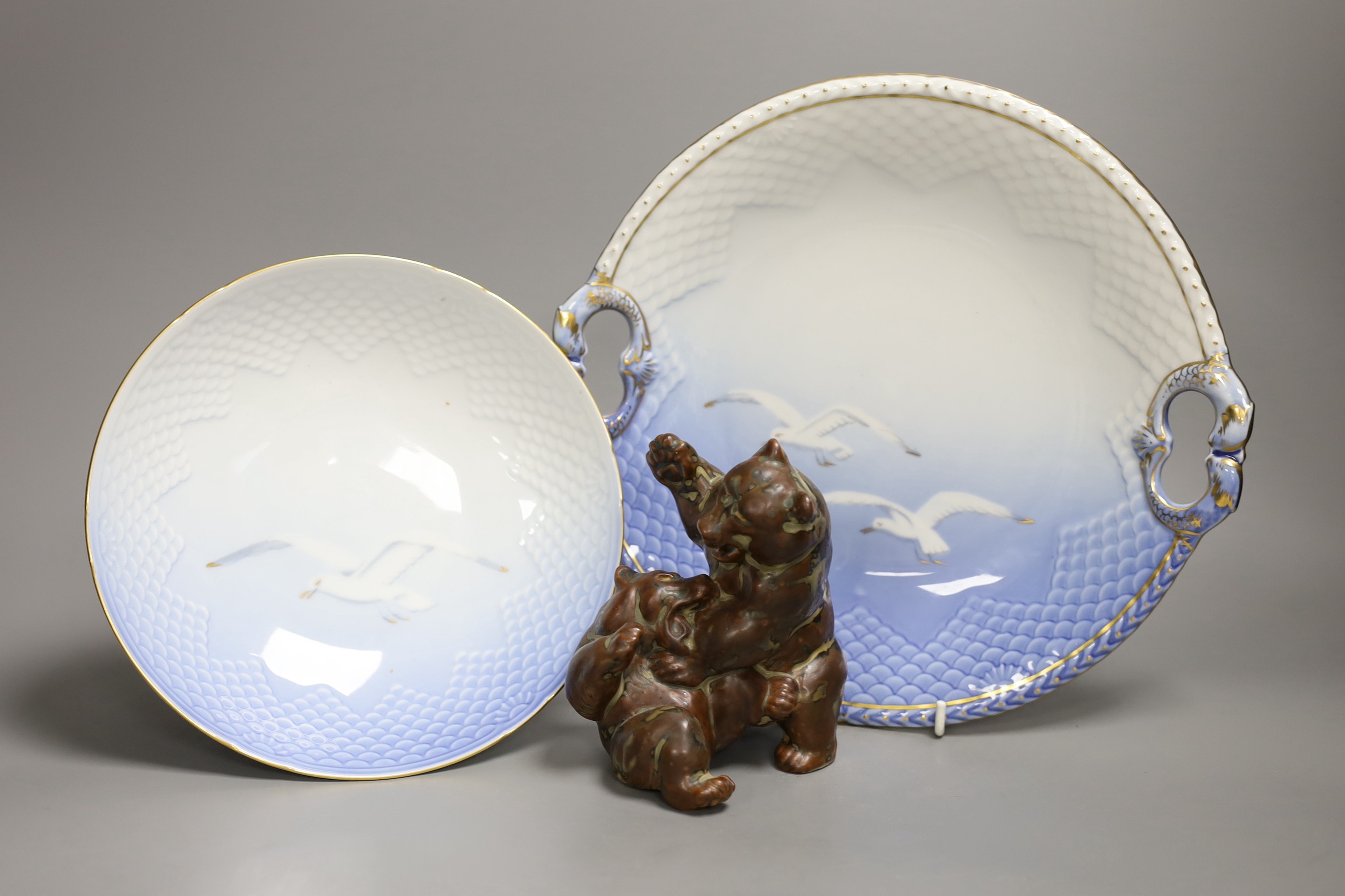 A Royal Copenhagen group of two bears and two similar dishes, largest 27cm